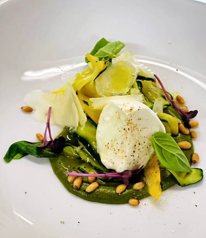 Shaved courgette and mozzarella over a green purée.